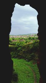 View of landscape against cloudy sky