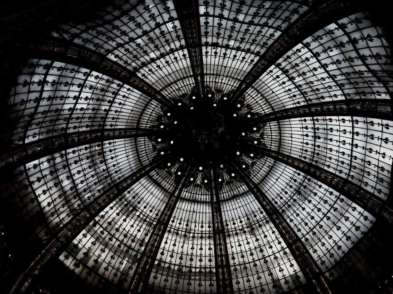 indoors, architecture, built structure, ceiling, pattern, low angle view, architectural feature, full frame, illuminated, backgrounds, design, interior, circle, geometric shape, skylight, directly below, modern, no people, building, building exterior