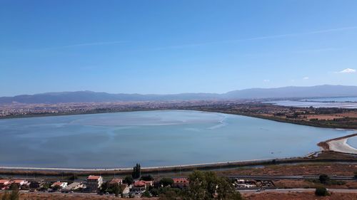 High angle view of sea against blue sky