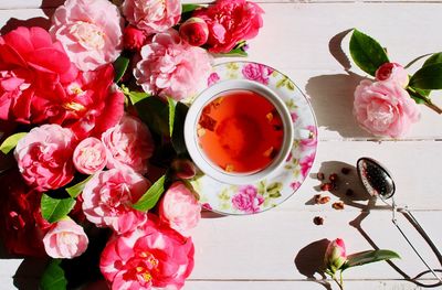 High angle view of pink roses on table