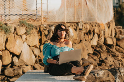 Young woman using digital tablet