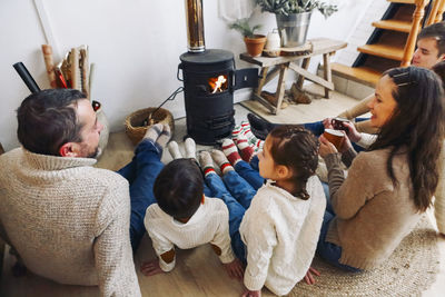 High angle view of people sitting at home