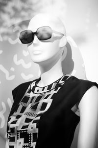 Close-up of mannequin with clothing in store