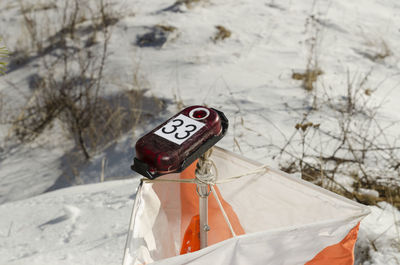 Close-up of compass and map