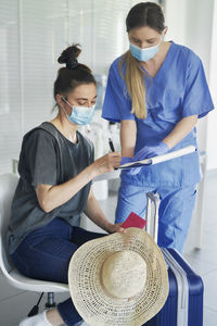 Side view of man working in kitchen