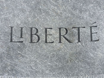 Close-up of text on wall
