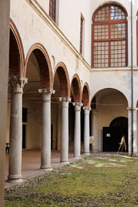Loggia, arches and corridor of the medieval fortress of the rossi in san secondo, parma - italy.