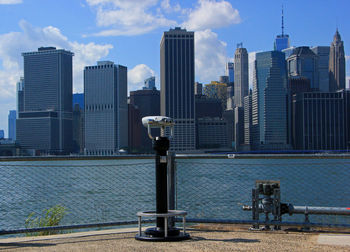 Modern buildings in city against sky