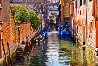 Canal passing through city buildings