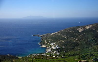 High angle view of sea and buildings against sky