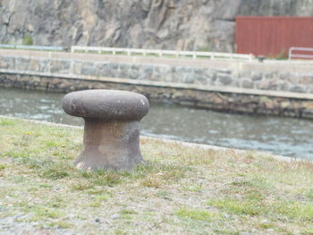 Close-up of bridge over river against sky