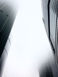 Low angle view of modern buildings against sky