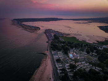 High angle view of sea against sky during sunset