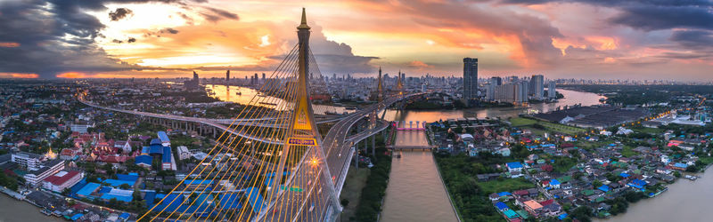 High angle view of city buildings during sunset