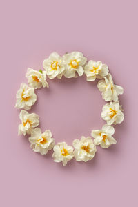 Directly above shot of heart shapes on pink background