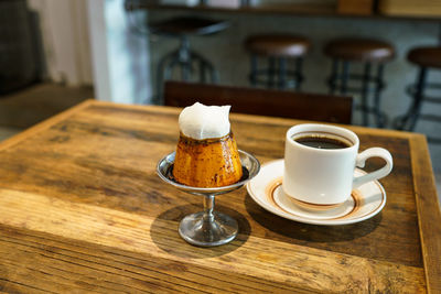 Close-up of coffee cup on table