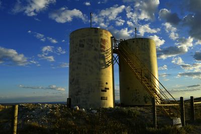 Built structure by sea against clear sky