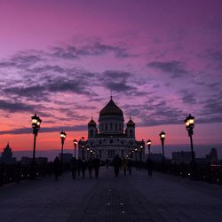 Road leading towards temple of christ the savior against sky during sunset