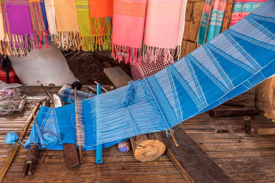 Multi colored chairs on table