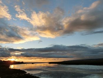 View of calm sea at sunset