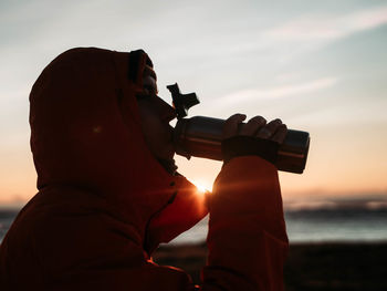 Sunrise and warm drink