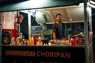 Portrait street market food owner