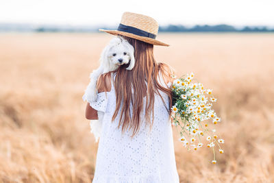 View of dog standing on field