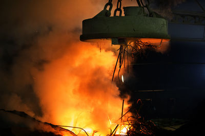 Low angle view of fire hydrant at night