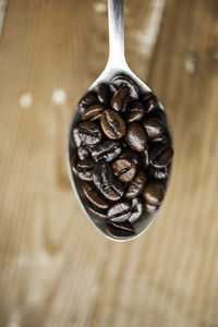 High angle view of coffee beans on table