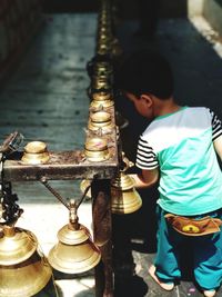 Rear view of boy at temple