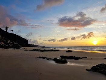 Scenic view of sea against sky during sunset