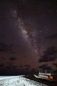 Scenic view of sea against sky at night