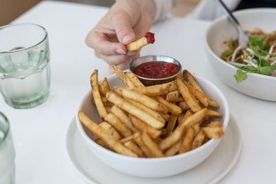 High angle view of person preparing food on table