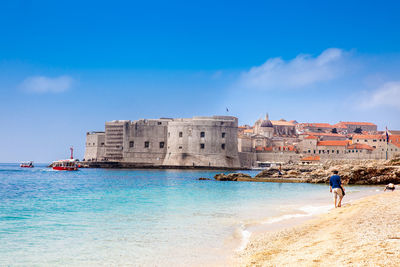 The beautiful banje beach and dubrovnik city