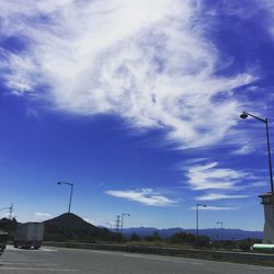 Road against cloudy sky