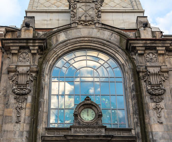 Low angle view of clock tower of building