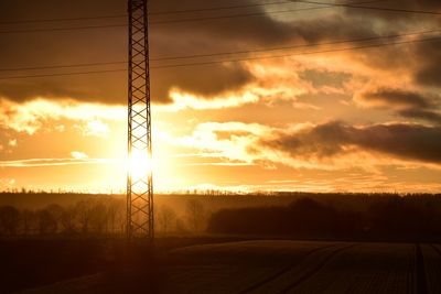 Scenic view of landscape against sky during sunset
