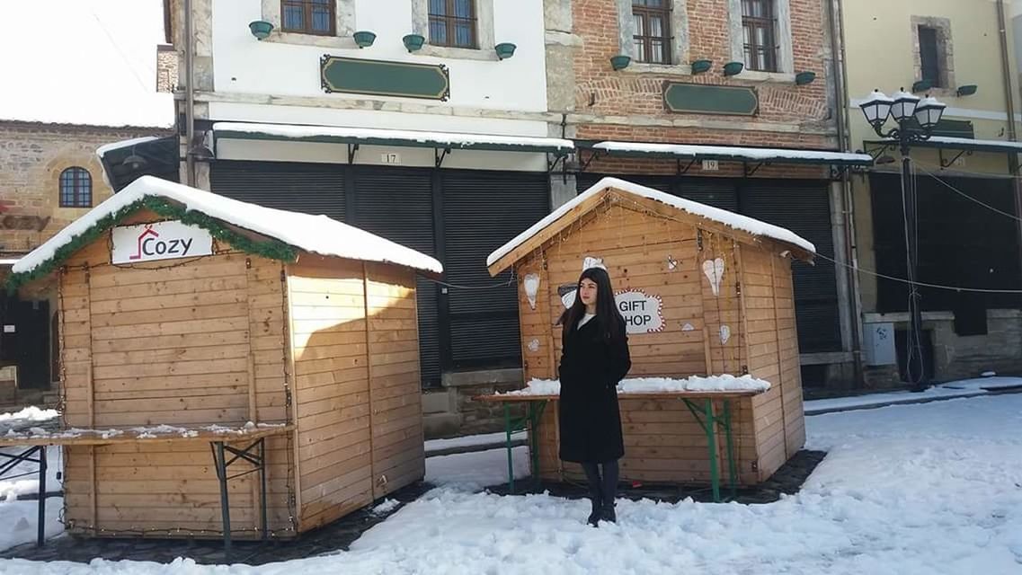 winter, snow, building exterior, architecture, cold temperature, built structure, real people, building, one person, full length, lifestyles, day, warm clothing, standing, clothing, nature, outdoors, women