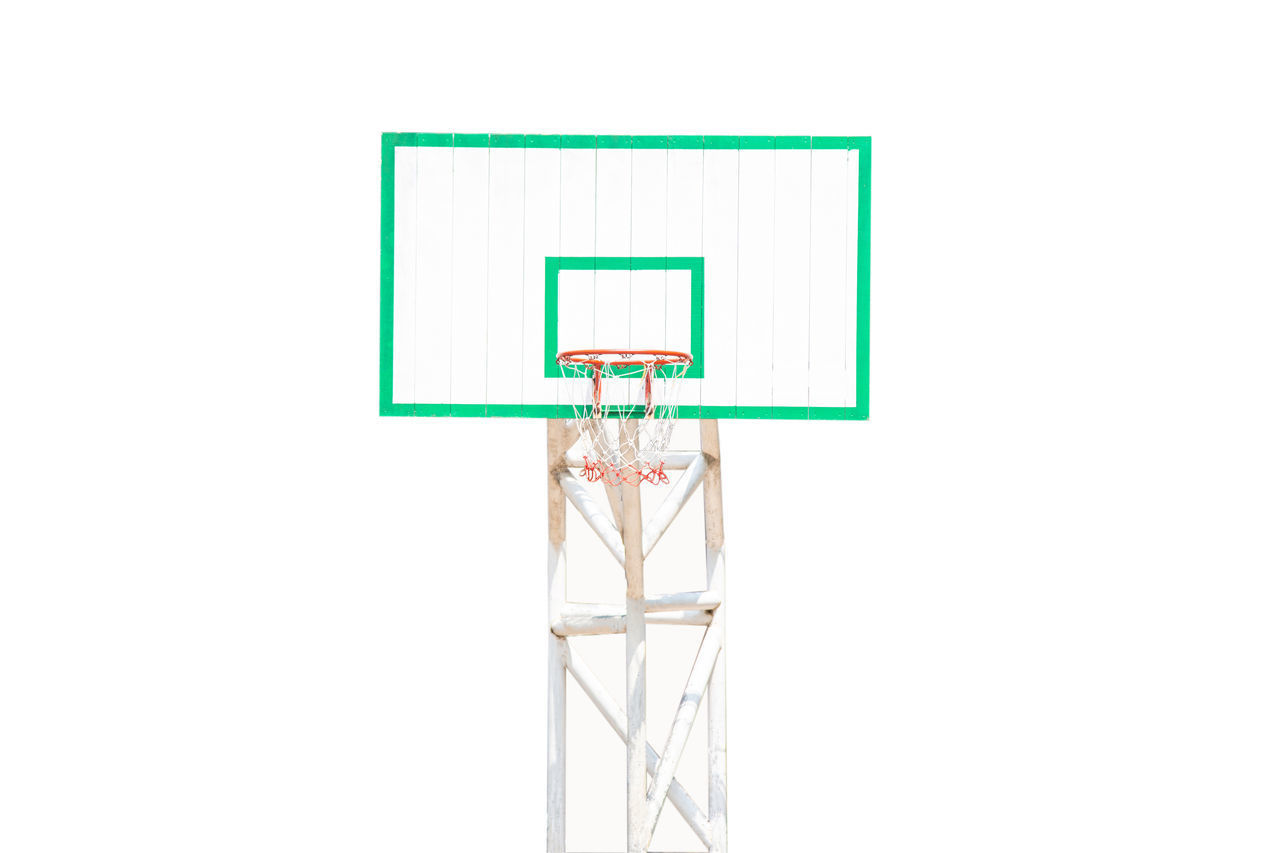 CLOSE-UP OF BASKETBALL HOOP AGAINST BLUE BACKGROUND