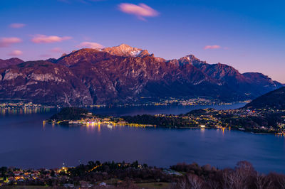 Lake como, bellagio, tremezzo and the mountains above, from tremezzo, at sunset.