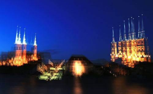 View of illuminated buildings at night