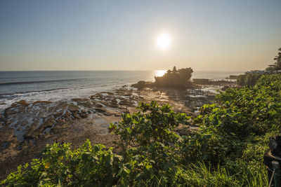 View of the tanah lot temple during sunset