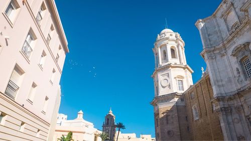 Low angle view of cathedral against clear blue sky