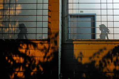 Reflection of man on window