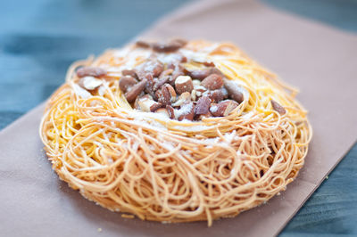 High angle view of noodles in plate on table