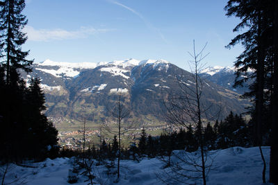 Scenic view of mountains against sky during winter