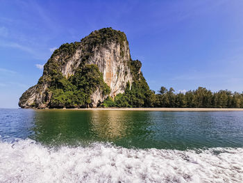 Scenic view of sea against blue sky