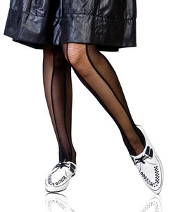 Low section of woman standing against white background