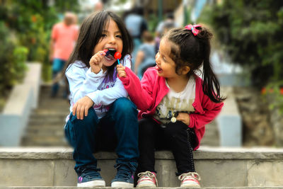 Friends sitting outdoors