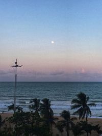 Scenic view of sea against sky at sunset